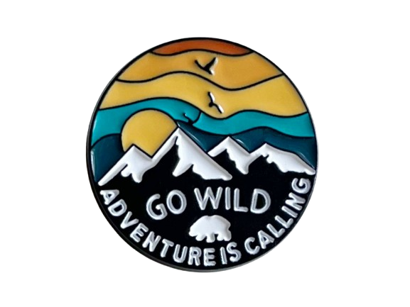 Camping Pin with Mountains and Sky Scene with Saying "Go Wild Adventure is Calling"