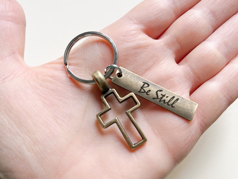 Bronze Cross Charm Keychain with "Be Still" Engraved Tag, Religious Keychain
