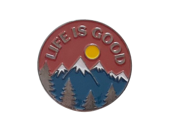 Camping Pin with Blue Mountains, Pine Trees, Sun, and Brown Sky Scene with Saying "Life is Good"