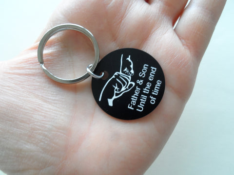 Fist Bump Keychain on a Black Aluminum Disc with Engraved Text "Father & Son Until the End of Time", Father's Keychain