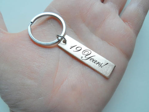 19 Year Anniversary Gift • Small Bronze Tag Keychain Engraved with "19 Years!"