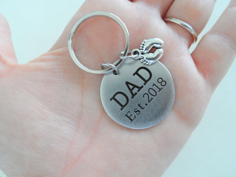 Dad Est. 2018 Disc Keychain with Baby Feet Charm; Father's Keychain