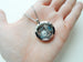 Class of 2025 Graduate Locket Necklace with Graduate Cap, 2025 Heart Charm, and Custom Letter & Birthstone - by Jewelry Everyday (Plain Edge Silver Locket)
