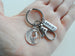Surfing Keychain with a Girl Surfer Charm, Brave Charm, and Swivel Clasp