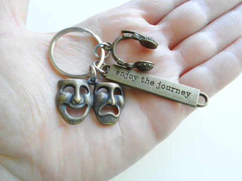 Bronze Theatre Masks Charm Keychain with Headset Charm & Enjoy the Journey Tag, Tragedy Comedy Drama Keychain, For Graduation Actors by JewelryEveryday