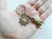 Bronze Rocket Ship Charm Keychain with Sun Charm by JewelryEveryday