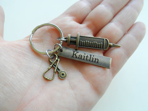 Medical Charm Keychain with Bronze Syringe & Stethoscope Charm with Custom Engraved Tag; For Medical Professional or Student