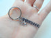 Volunteer Appreciation Gift - "VOLUNTEER" Tag & Silver Heart In Hand Charm Keychain with "We're grateful for your helping hands!" Card by Jewelry Everyday