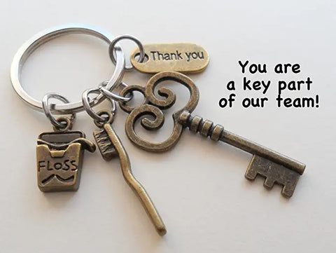 Dental Assistant, Dental Office Staff, Orthodontics Employee Thank You Keychain; Bronze Toothbrush, Floss & Key Charm Keychain