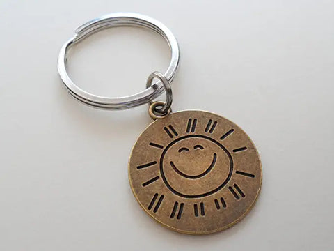 Bronze Sun Face Charm Keychain with Saying "You Are My Sunshine My Only Sunshine" on Backside