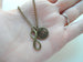 Bronze Infinity and Love Charm Necklace