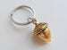 Elongated Golden Acorn Keychain - Peter Pan's Kiss