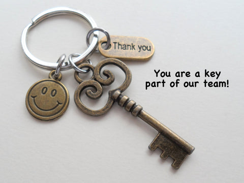 Swirl Design Bronze Key Keychain with Smiley Face Charm, Employee Appreciation Gift, Volunteer Gift - You Are a Key Part of Our Team