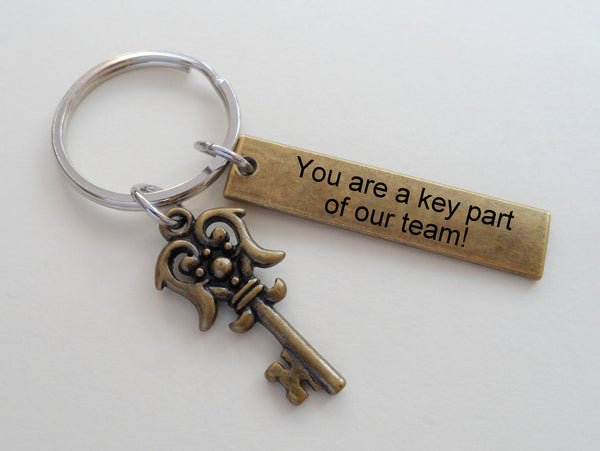 Bronze Key with Engraved Tag with Saying "You are a Key Part of Our Team"; Employee Appreciation Keychain