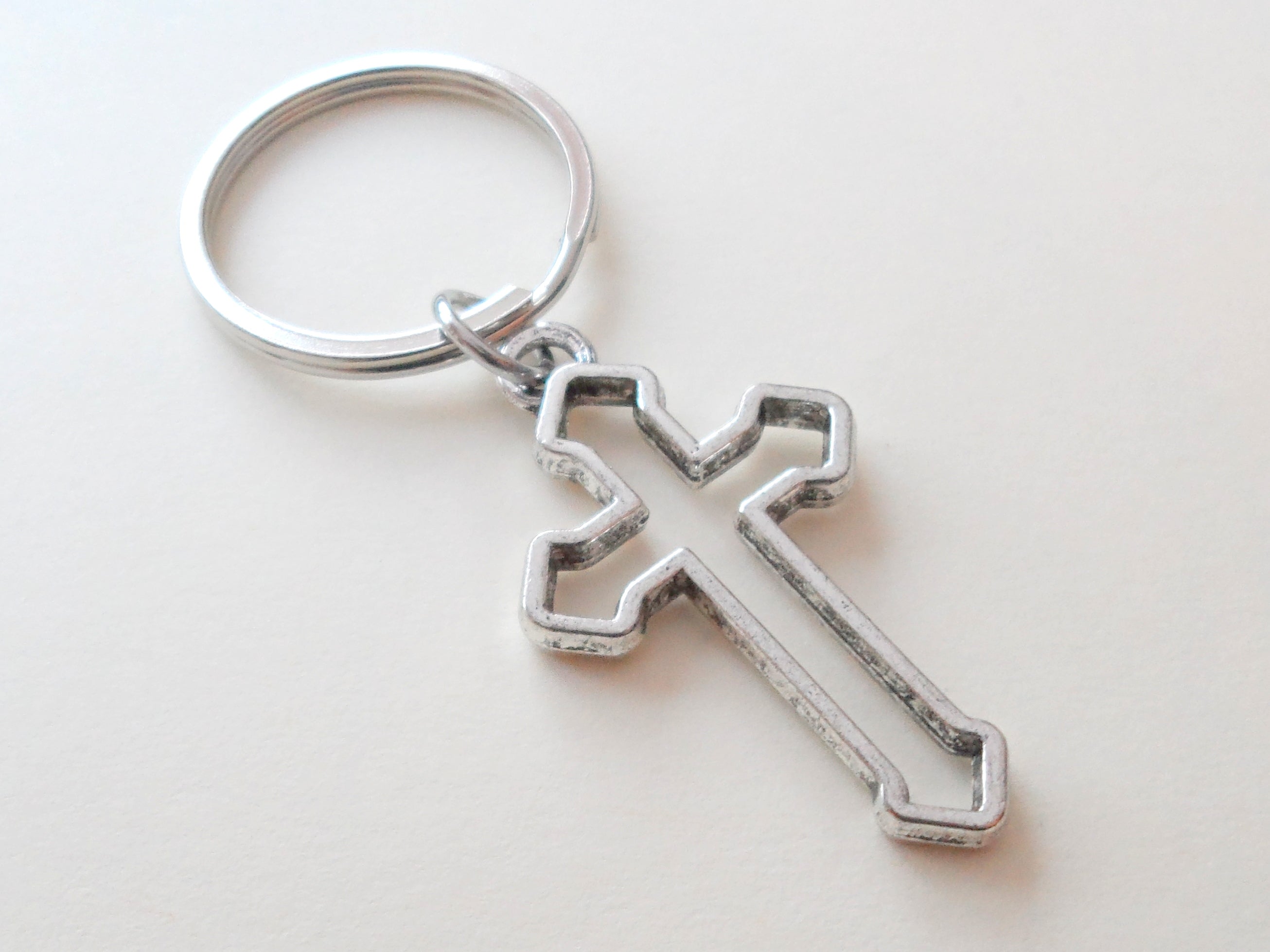 Cross keychain on sale