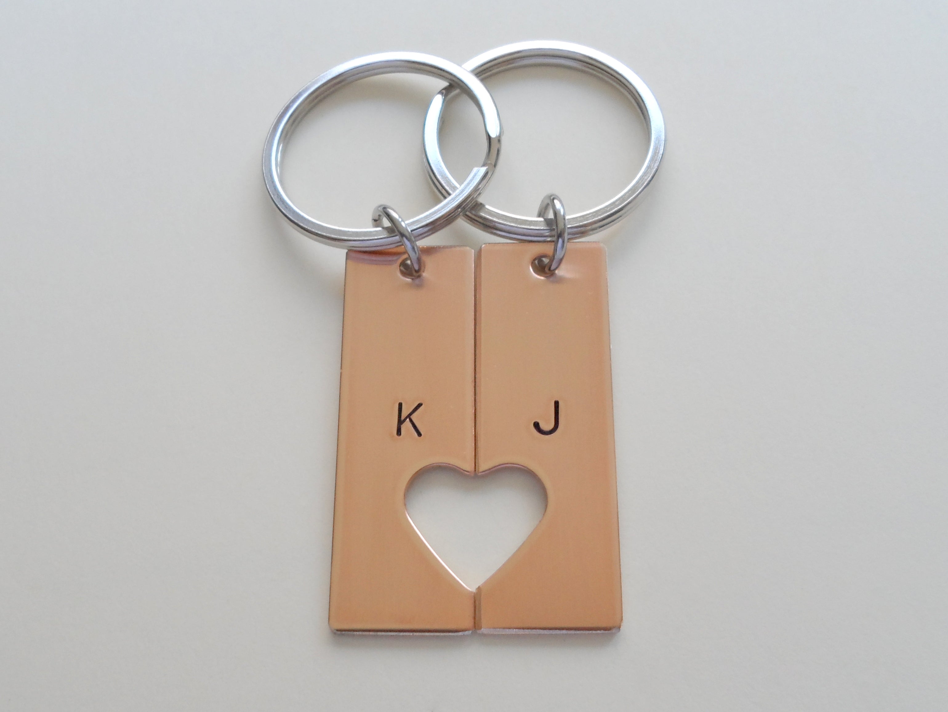 Personalized Bronze Keychains With Cutout Matching Heart Shape